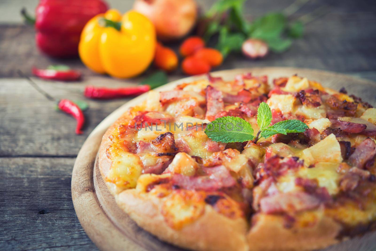 Delicious italian pizza on wooden table