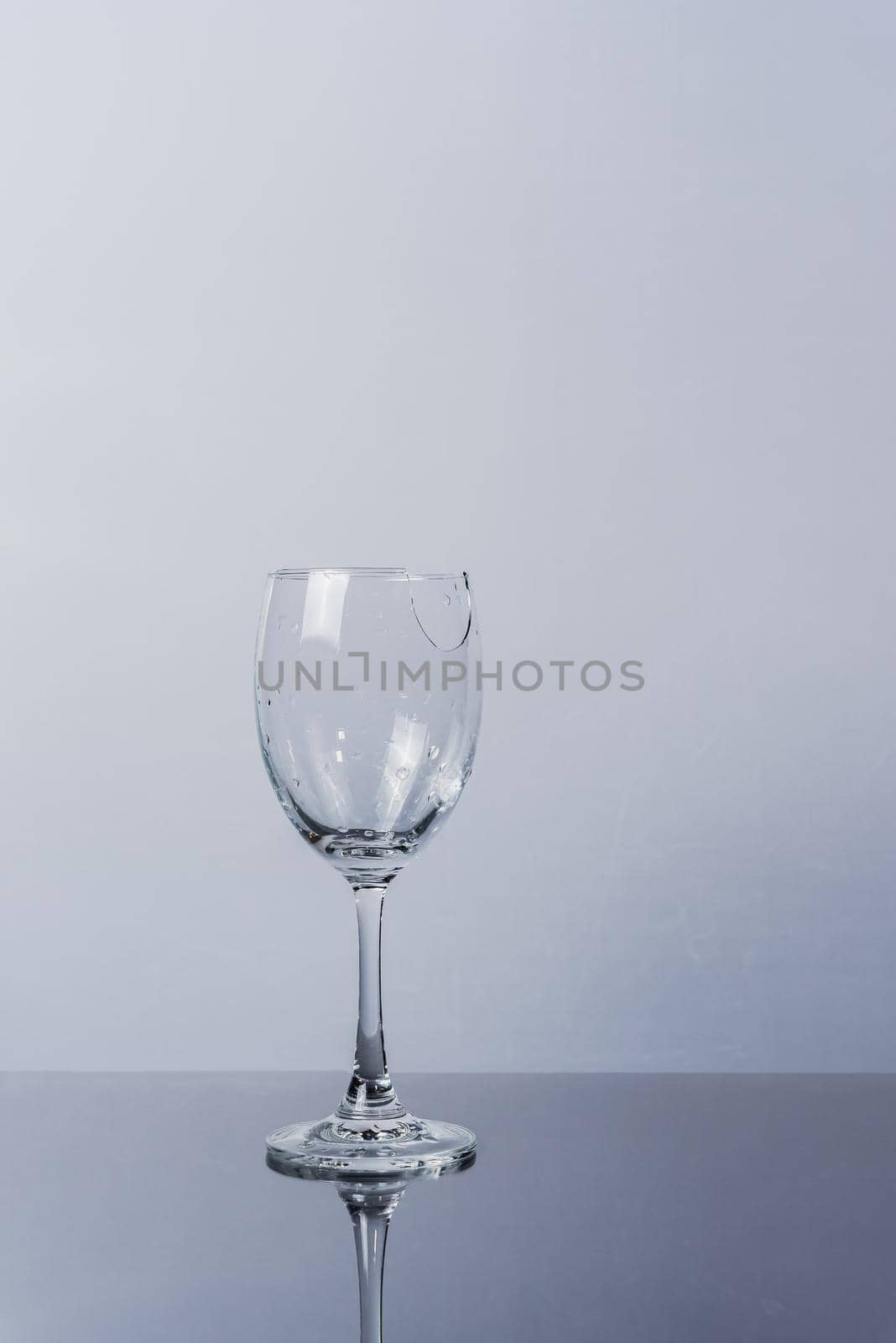 broken vine glass on white backgeound isolated