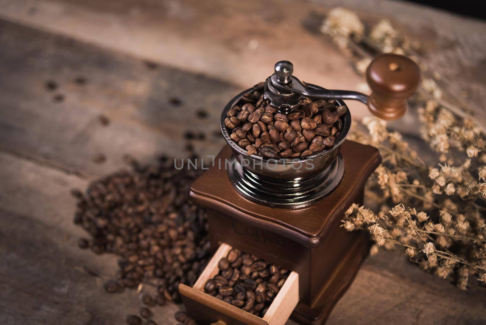 Coffee grinder and coffee beans by Wmpix