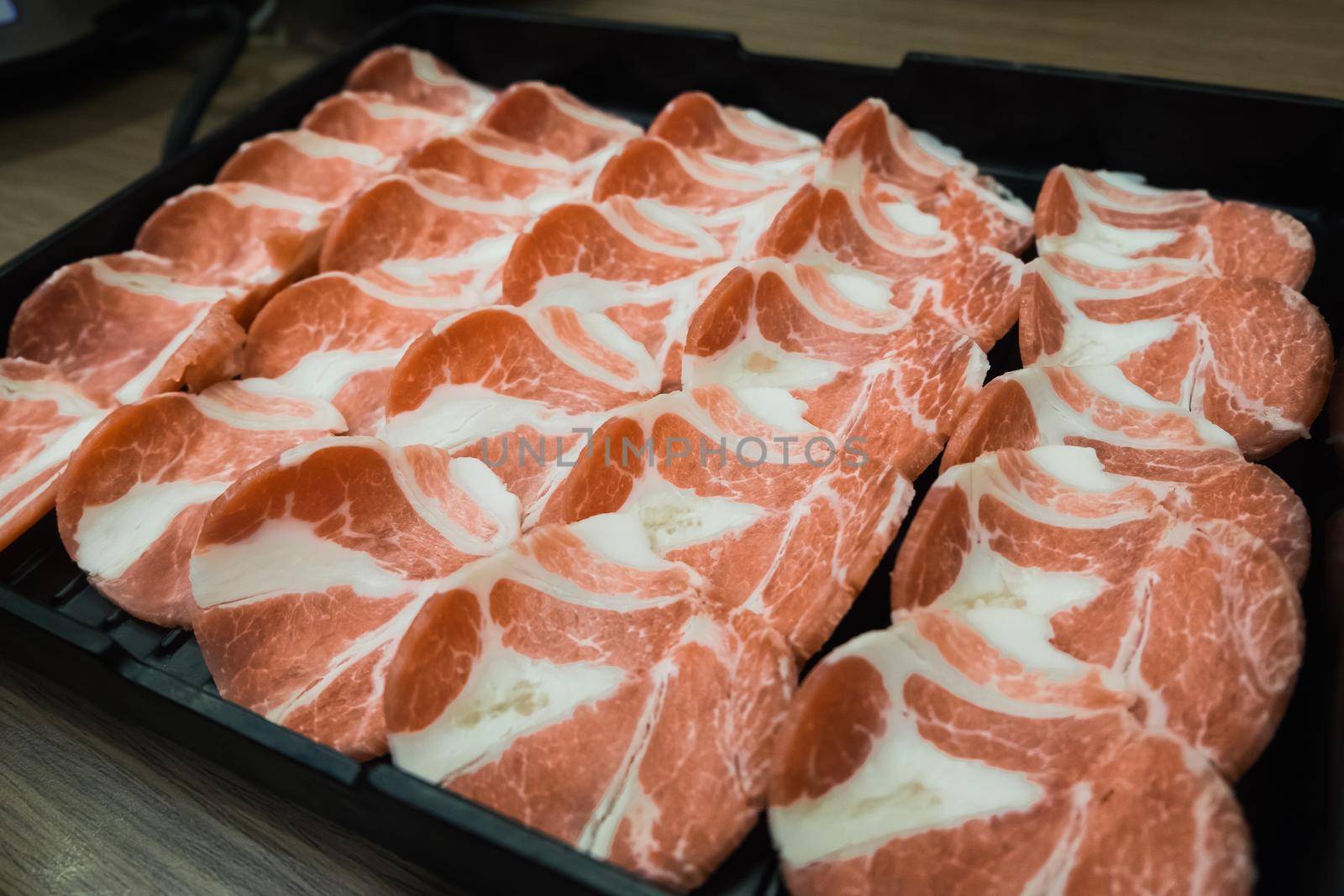 Raw beef slice for barbecue or Japanese style yakiniku by Wmpix