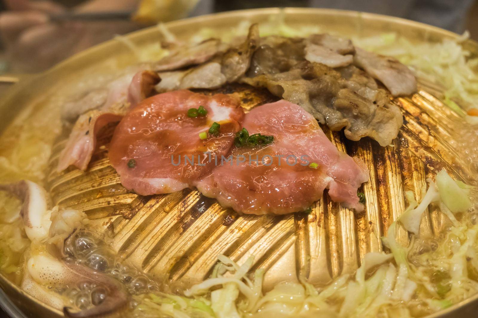 Raw beef slice for barbecue or Japanese style yakiniku by Wmpix