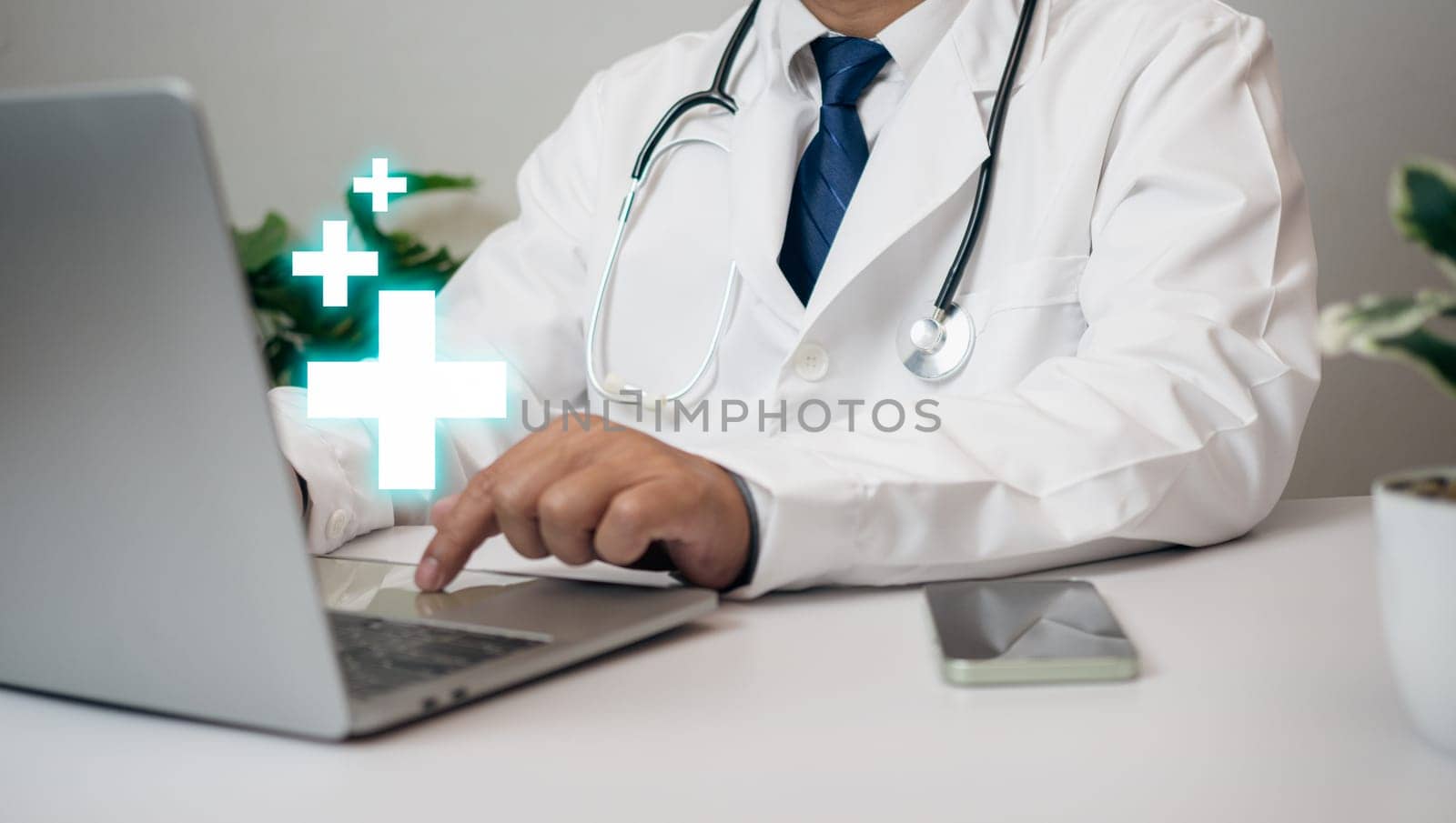 Doctors use computers to research medical information. Medical concept. insurance concept by Unimages2527