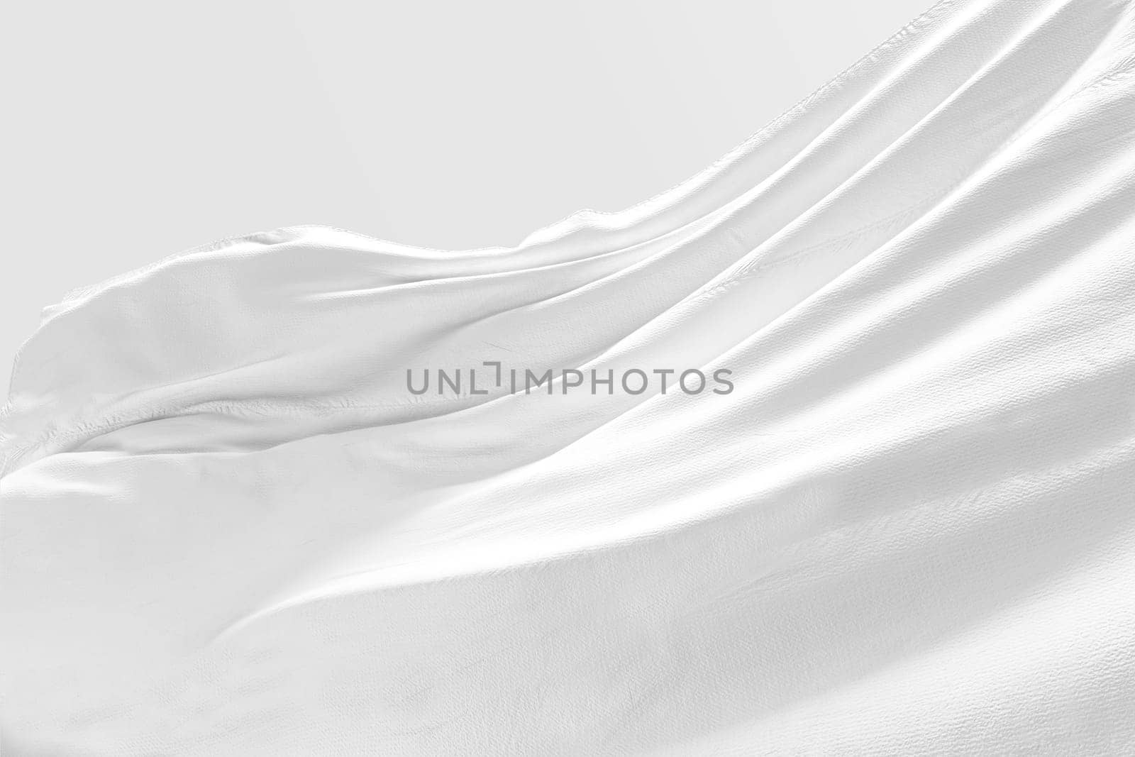 Background texture of crumpled white fabric on a light background with space for text