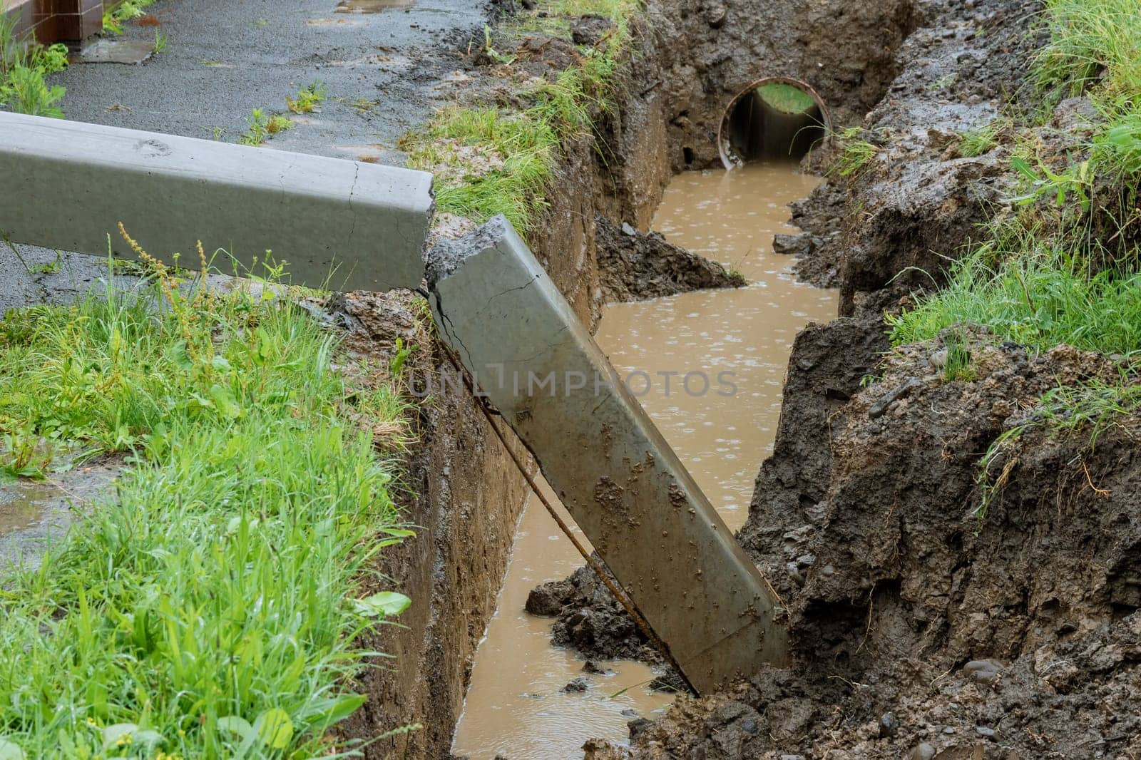 Concrete electrical pole collapsed, leading to a disruption in power supply. Excessive weight of water on electrical poles resulted in their collapse.