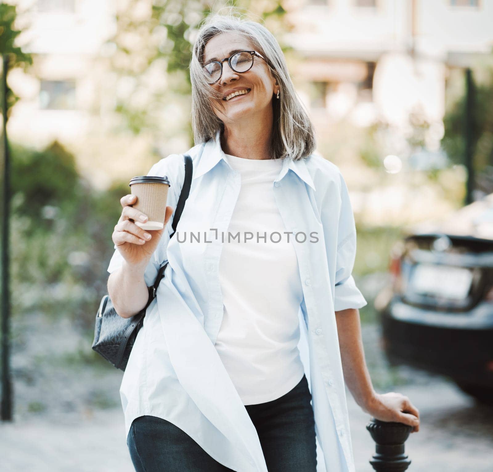 Woman in good mood, radiating happiness and contentment with life. The image features lady standing on a street, exuding joyful and carefree demeanor. . High quality photo