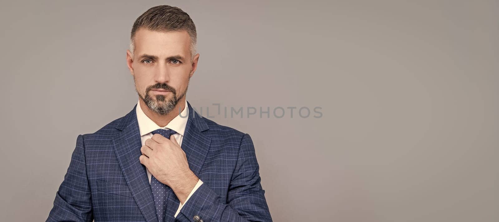 Man face portrait, banner with copy space. confident businessman in formalwear. business success. successful man in businesslike suit. by RedFoxStudio