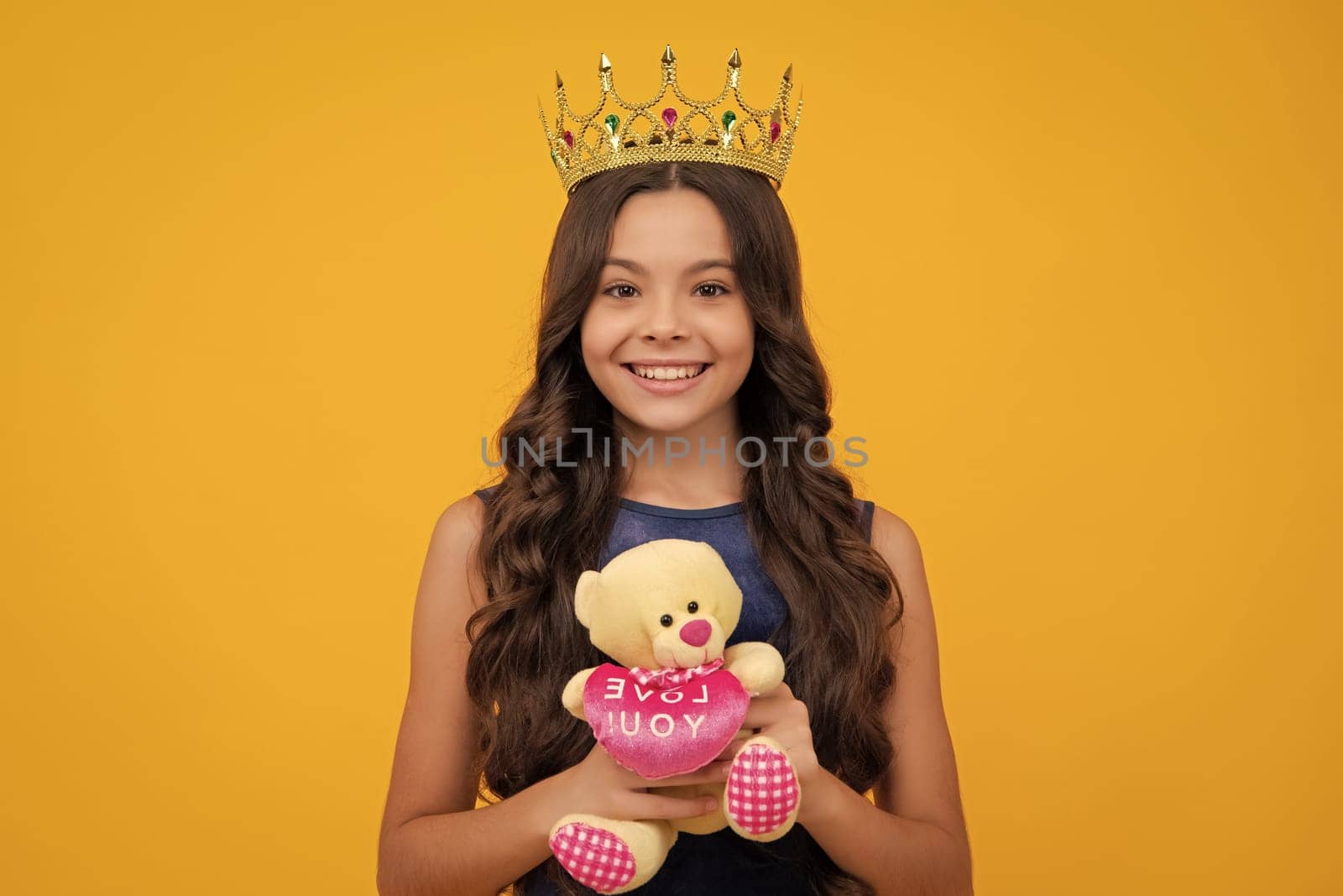 Birthday kids prom party. Girls party, funny kid in crown. Child queen wear diadem tiara. Cute little princess portrait. Happy girl face, positive and smiling emotions