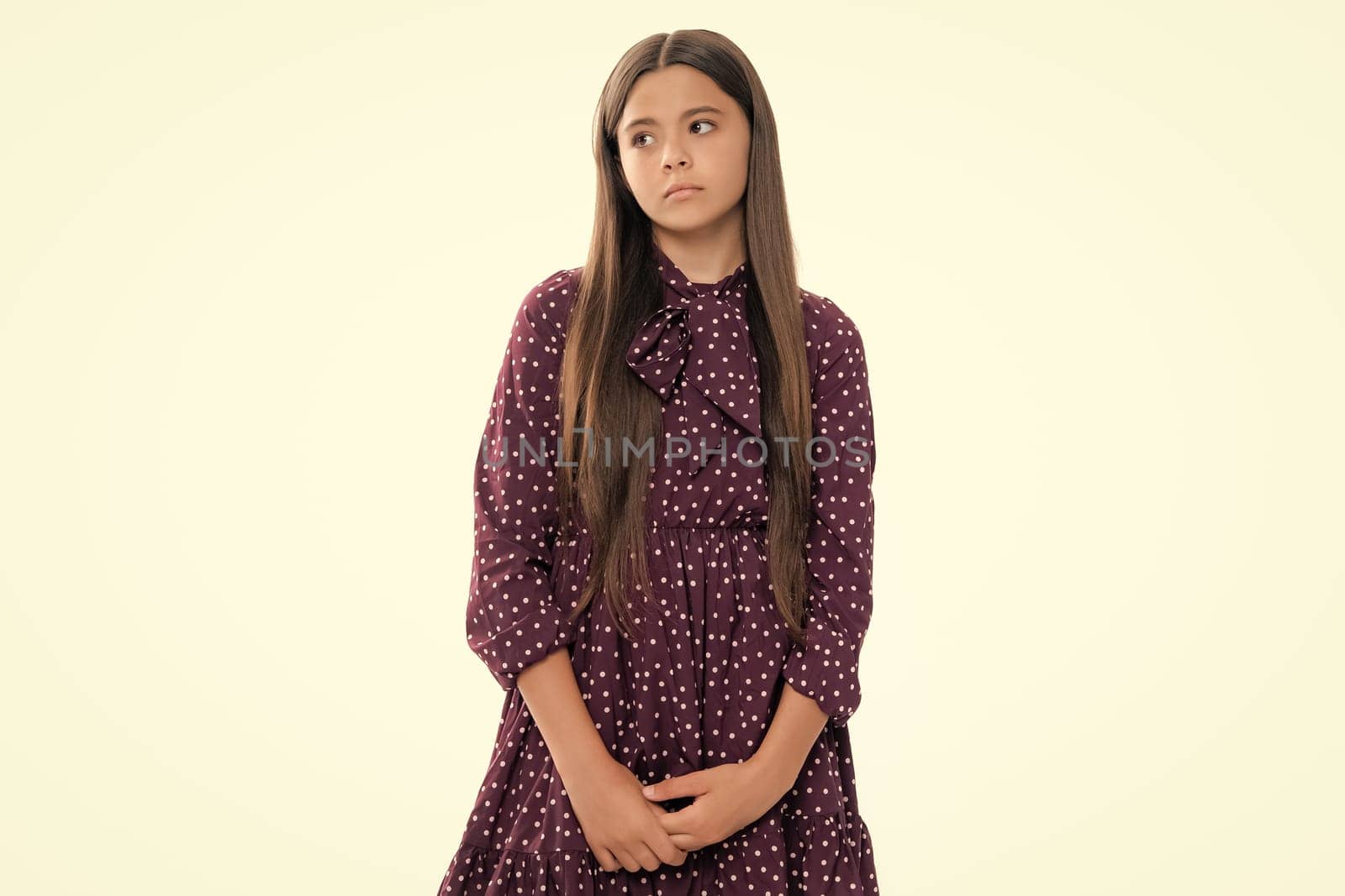 Pretty teenage girl in studio. Child girl portrait