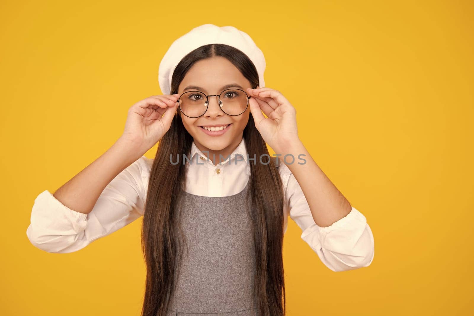 Happy face, positive and smiling emotions of teenager girl. Teenager child with poor eyesight wear eyeglasses, looking squinting. Kids glasses