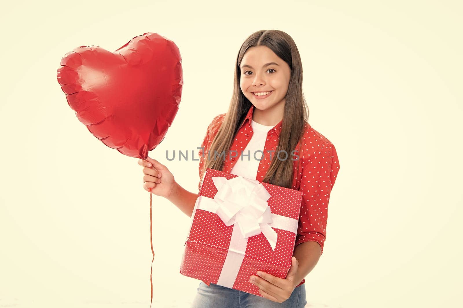 Love valentines day. Cute teenager child girl congratulate with valentines day, giving romantic gift box. Present, greeting and gifting concept. Birthday holiday concept