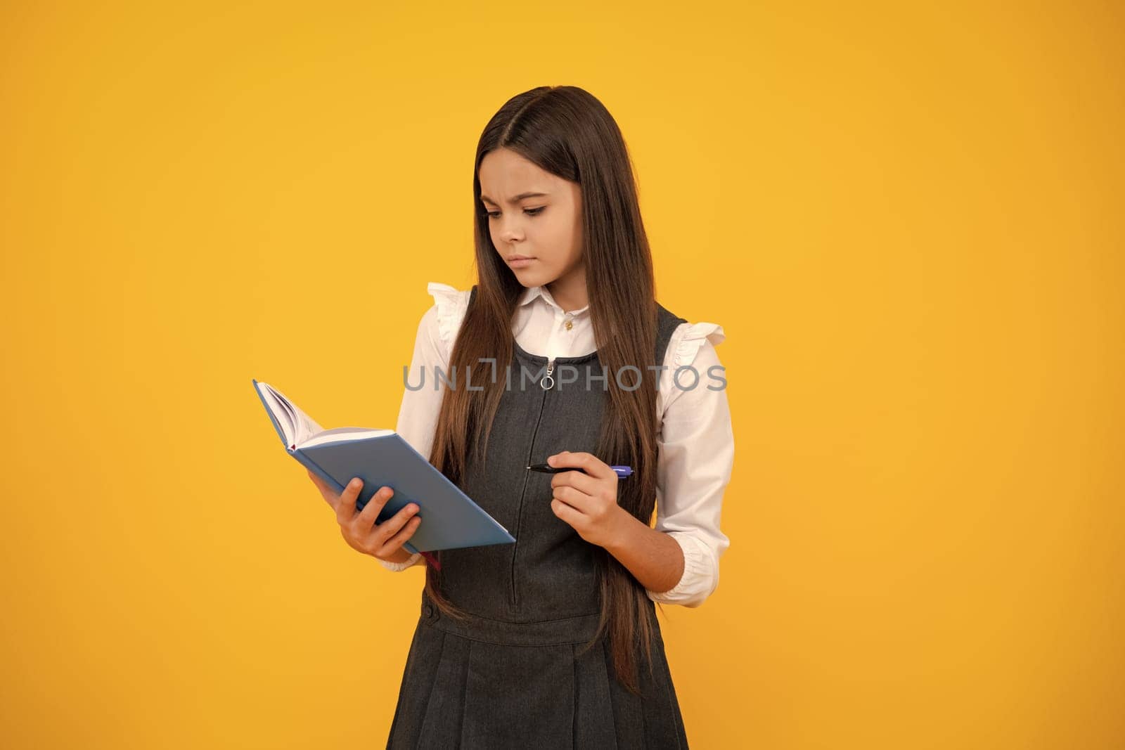 Teenage school girl with books. Schoolgirl student. Thinking pensive clever teenager girl. by RedFoxStudio