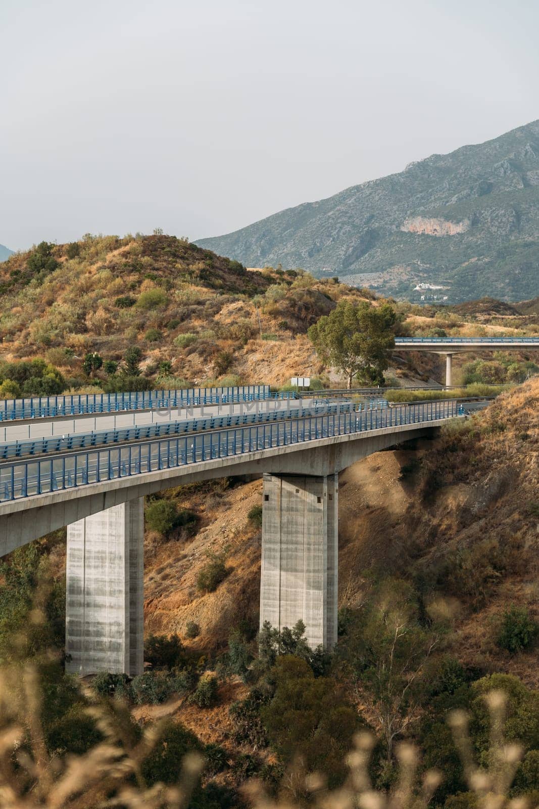 An impressive bridge connecting highway and sky, showcasing architectural marvel in Spain.