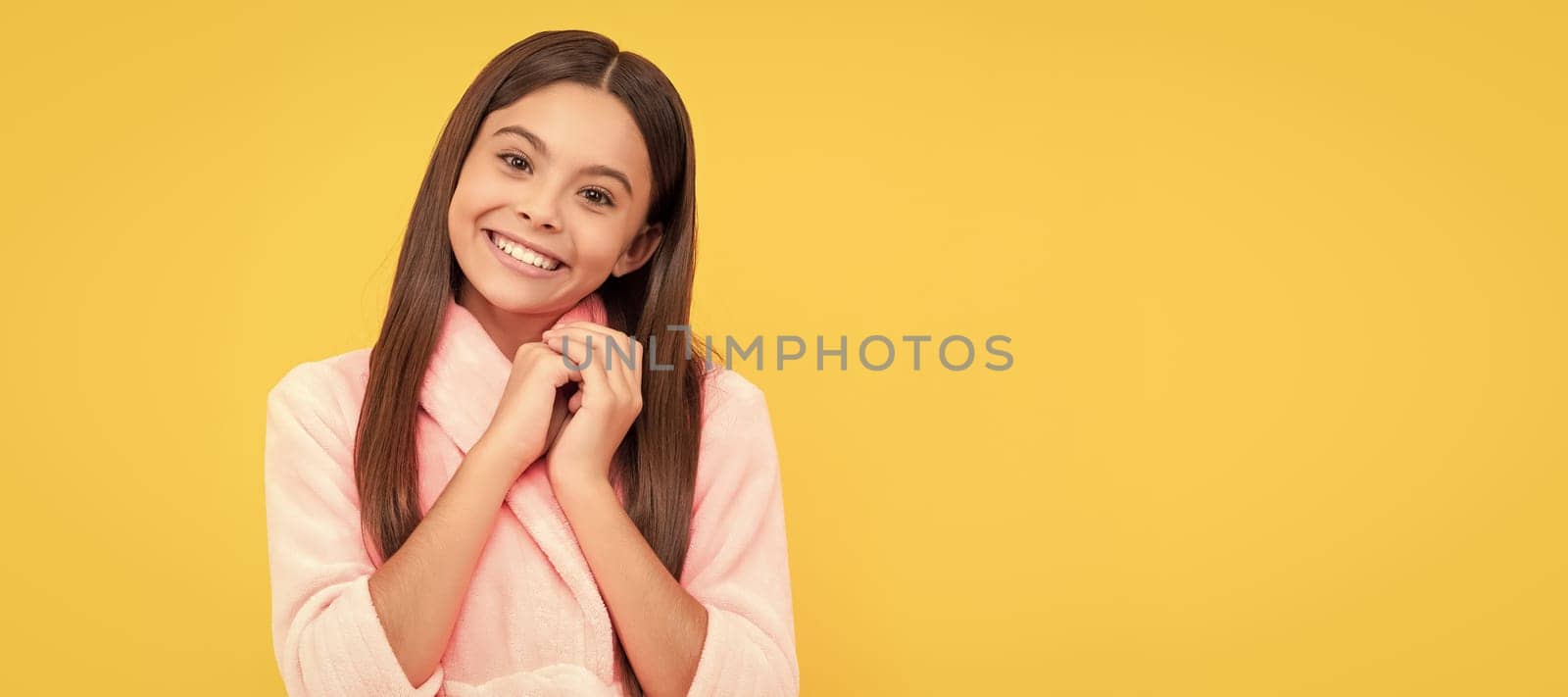 happy teen girl in home terry bathrobe, happiness. Child face, horizontal poster, teenager girl isolated portrait, banner with copy space. by RedFoxStudio