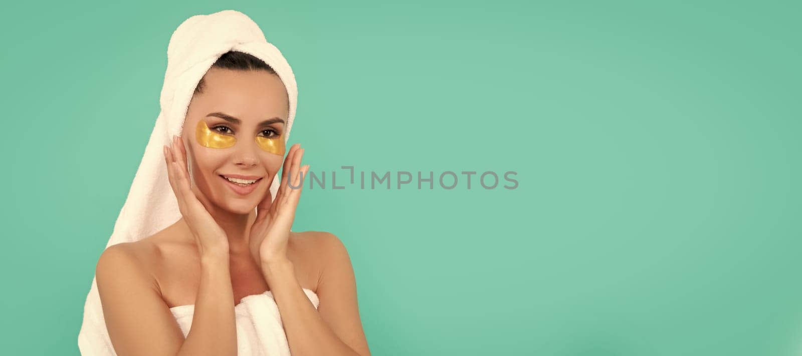 young woman in shower towel with rejuvenate patch. Woman isolated face portrait, banner with copy space. by RedFoxStudio