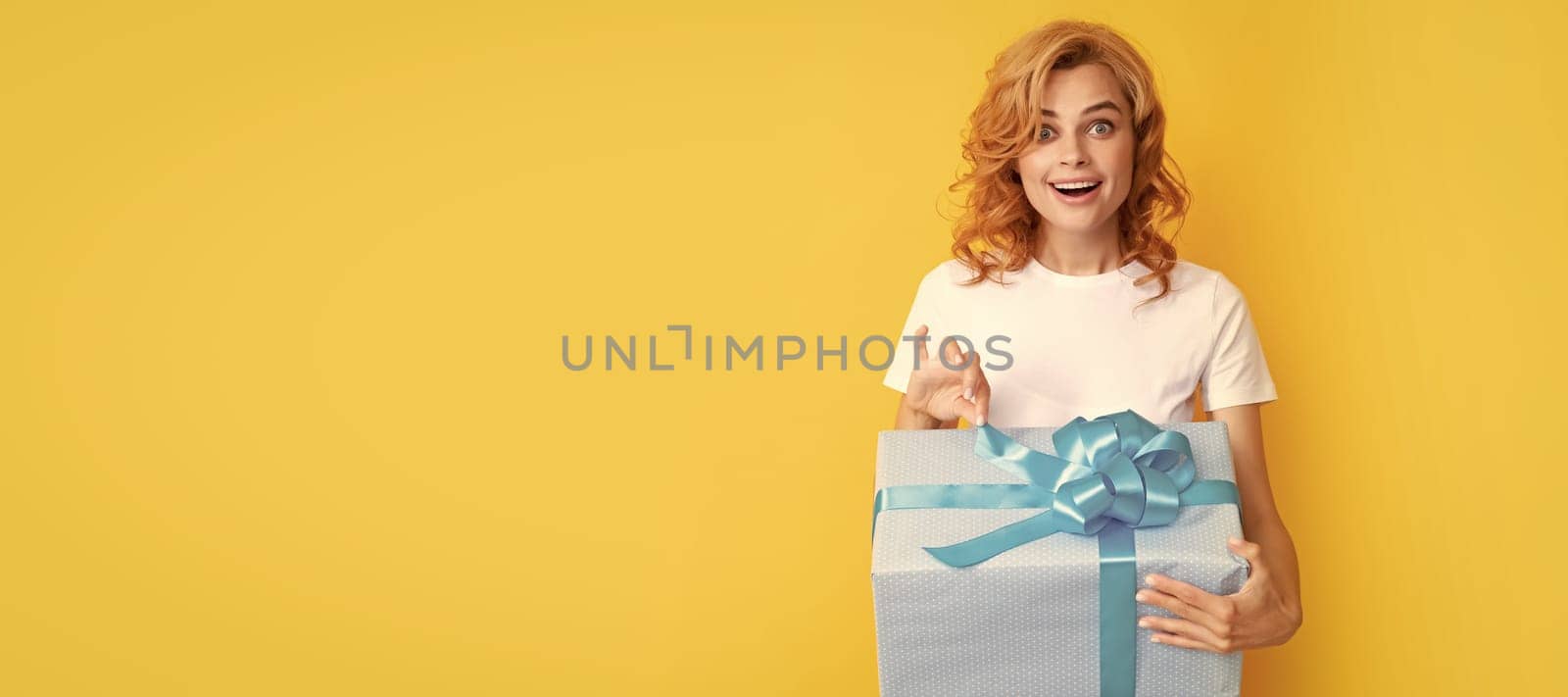 surprised redhead girl open gift box. boxing day. Beauty woman isolated face portrait, banner with mock up copy space. by RedFoxStudio