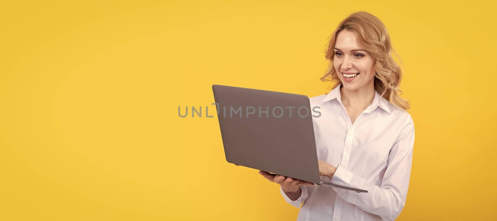 Woman isolated face portrait, banner with mock up copy space. internet access. check email. happy freelance woman post blog online. copy space