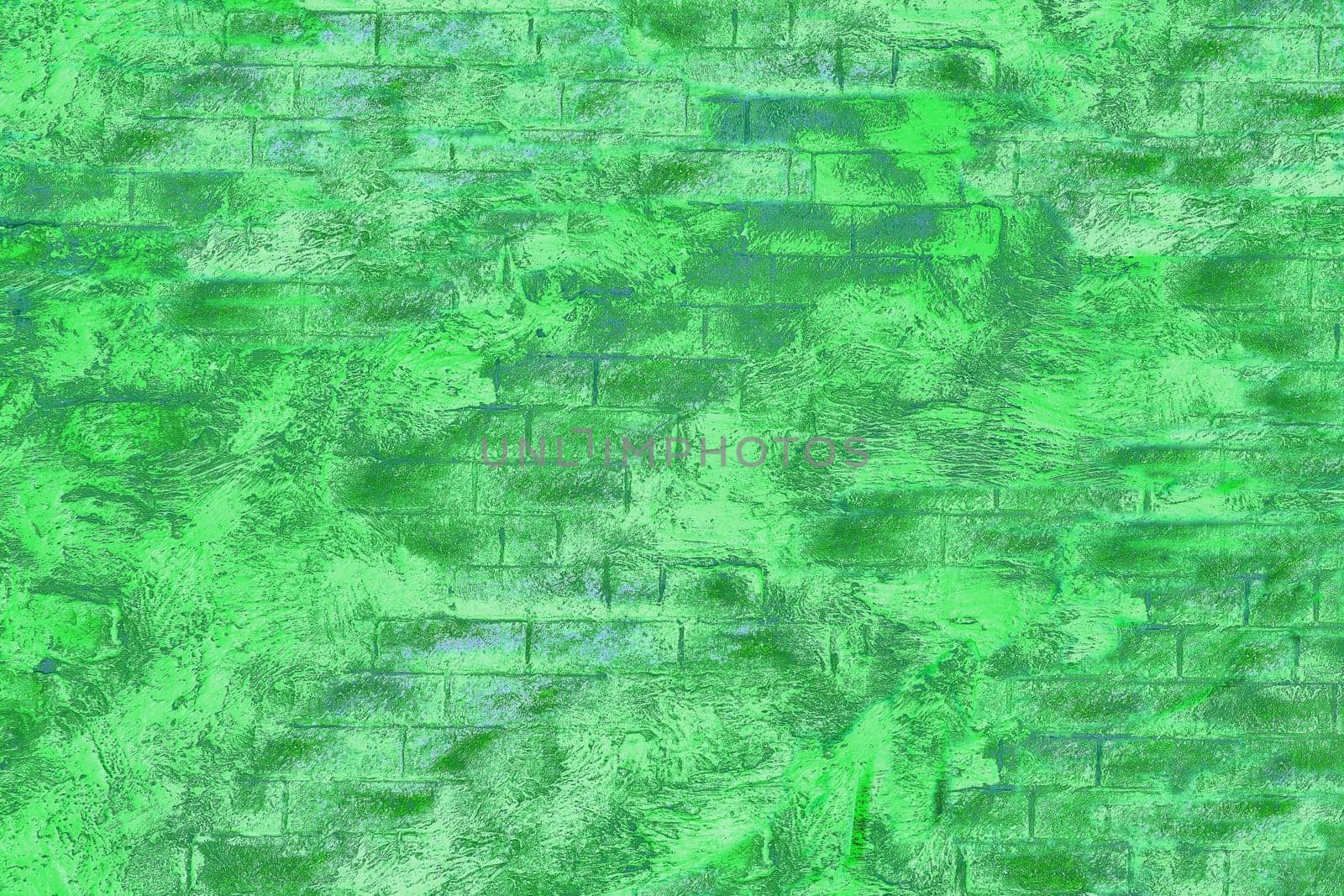 Green emerald brick wall with waves spots for text and decor by jovani68