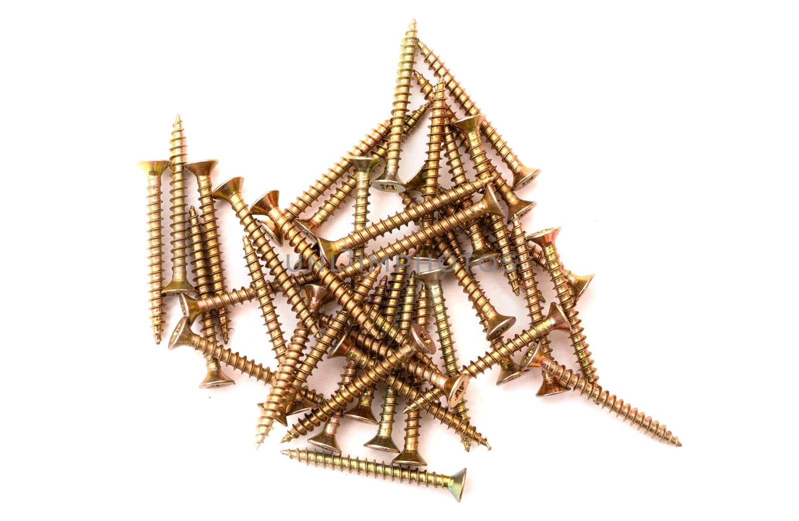 Pile of yellow self-tapping screws on a white background.