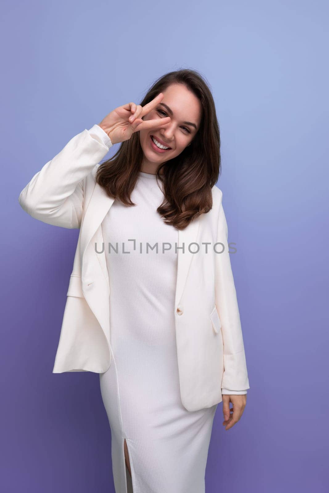 joyful winner brunette young woman in white dress won beauty contest.