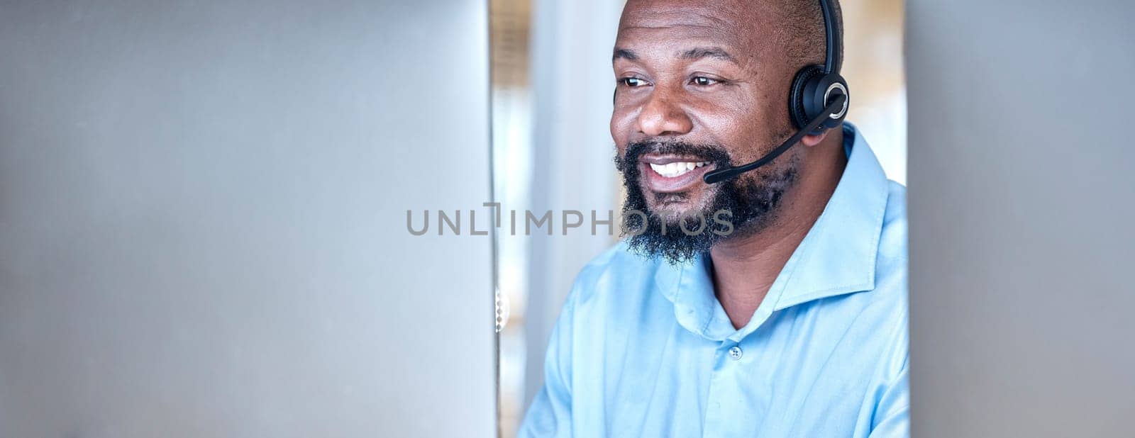Call center, black man and communication at computer for customer service, CRM and contact us on mockup space. Banner, face and happy male agent at desktop pc for telemarketing, consulting or support.