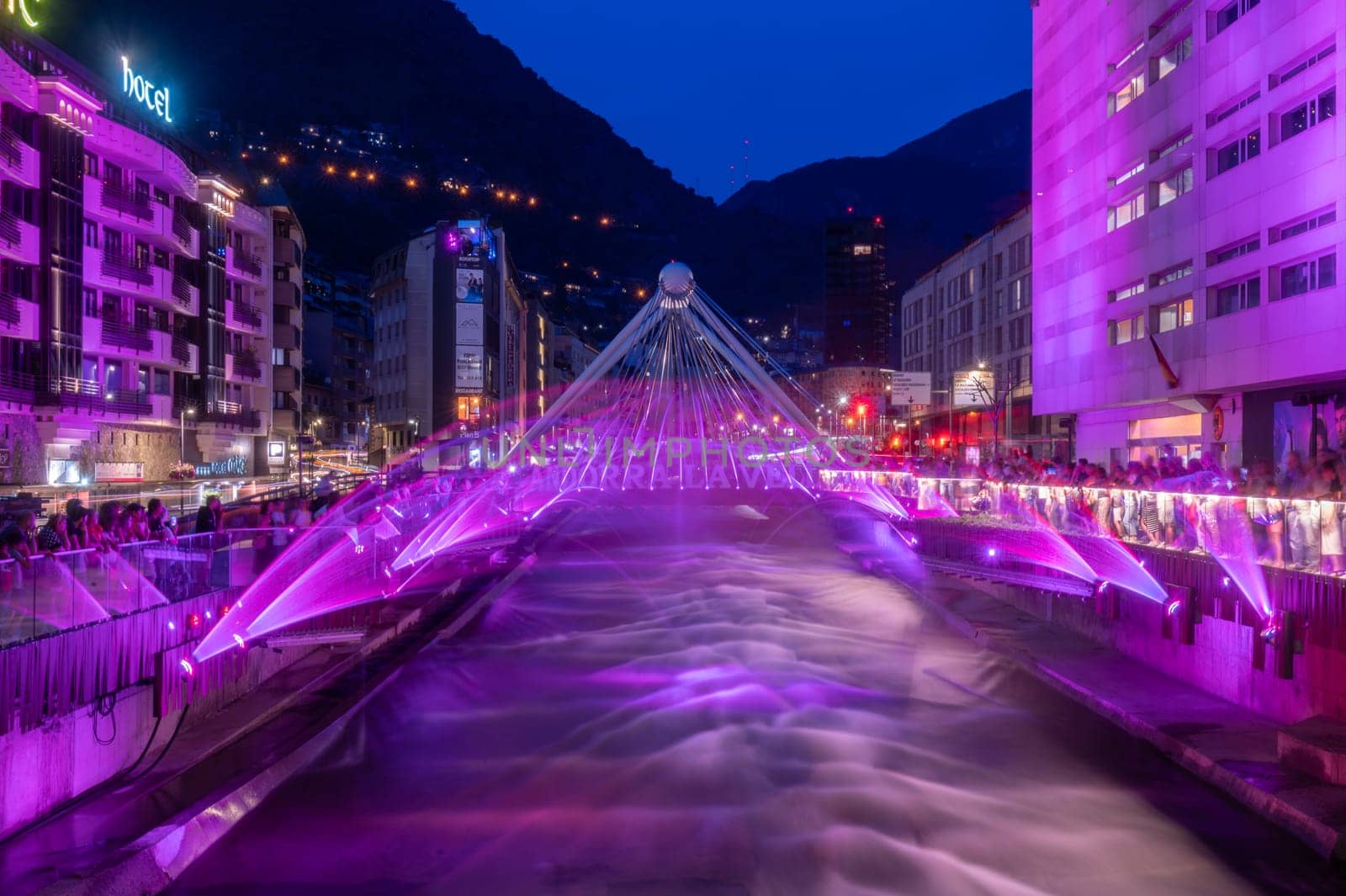 Andorra La Vella, Andorra : 2023 July 7 : Light and water show in the Capital of Andorra on the Valira River in Andorra La Vella in 2023.