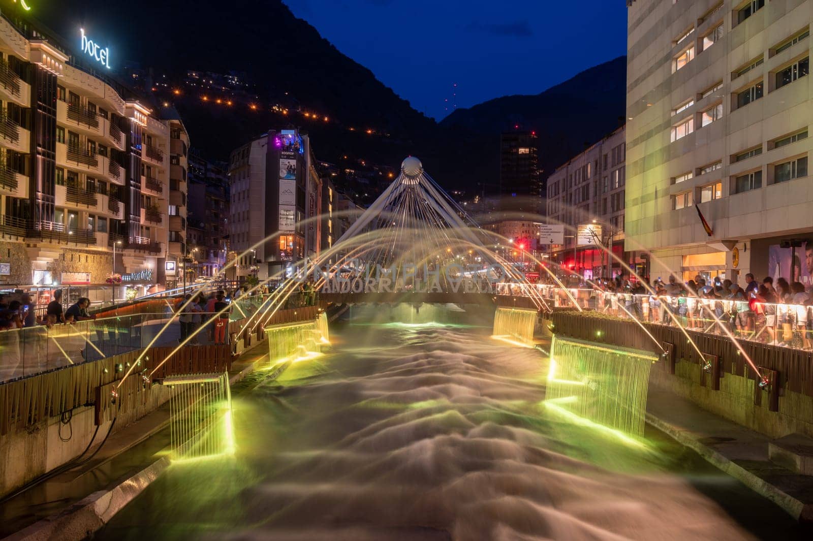 Andorra La Vella, Andorra : 2023 July 7 : Light and water show in the Capital of Andorra on the Valira River in Andorra La Vella in 2023.