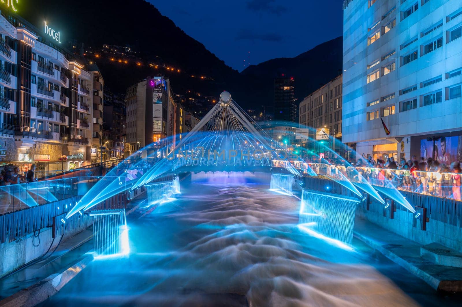 Light and water show in the Capital of Andorra on the Valira River in Andorra La Vella in 2023. by martinscphoto