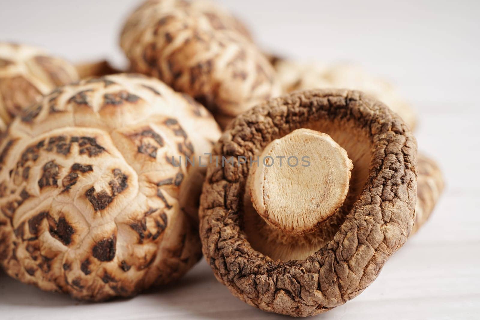 Dried shiitake mushroom isolated on white background with clipping path, healthy food.