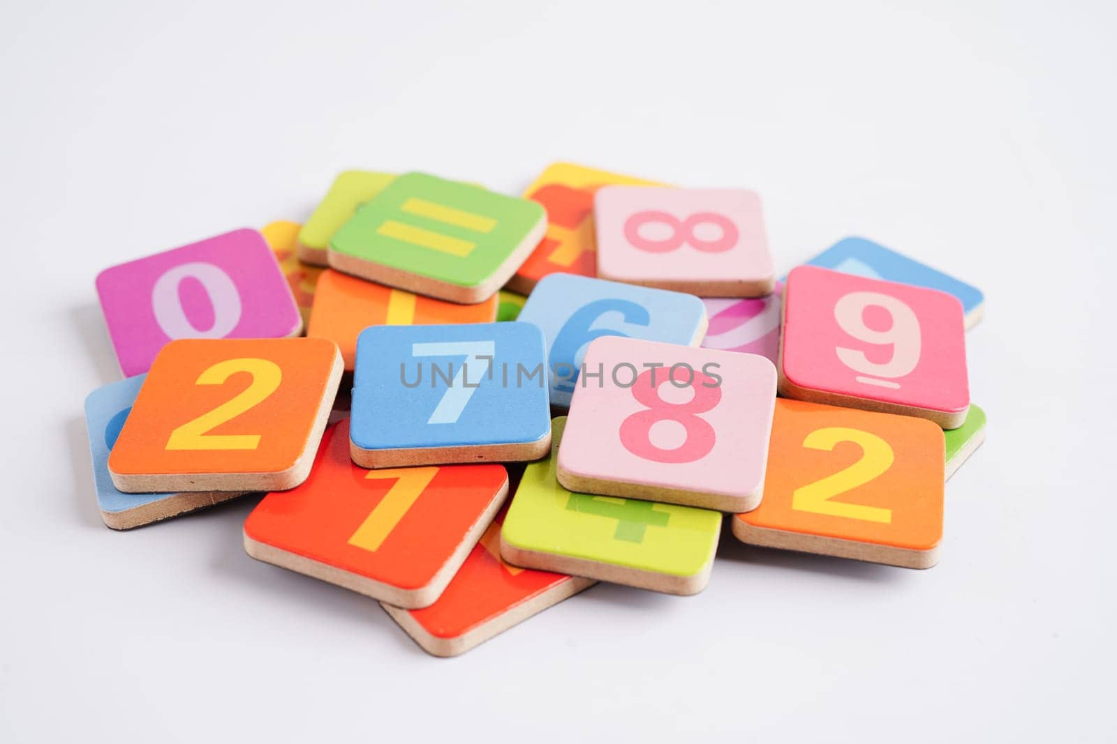 Number wood block cubes for learning Mathematic, education math concept.