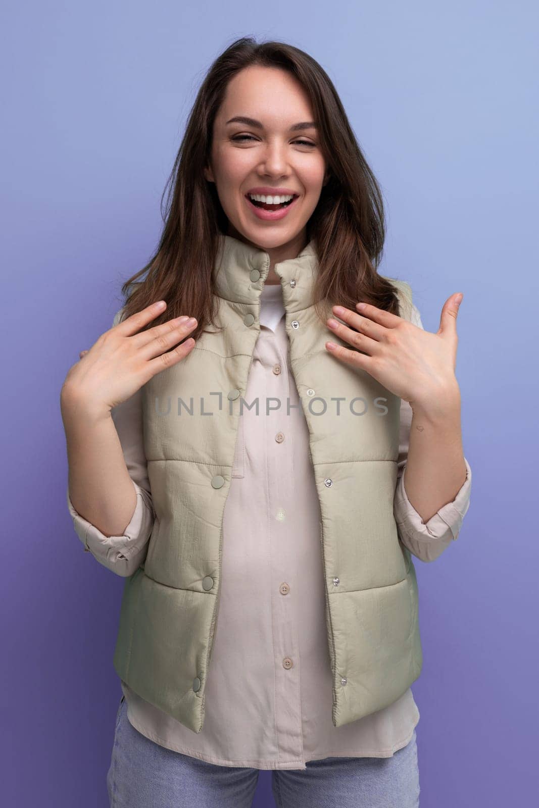 optimist 30s brunette young woman in casual look rejoices in victory.