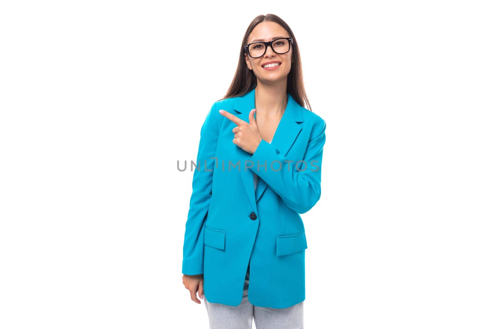 young successful brunette leader woman with long hair in a blue jacket.