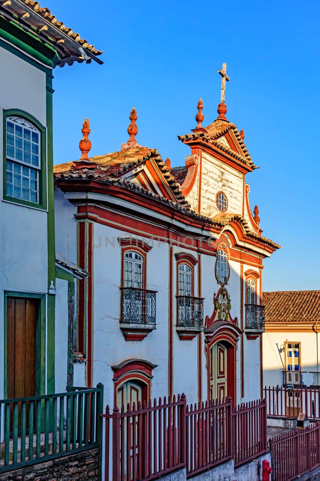 Baroque church facade and colonial houses in the city of Diamantina in Minas Gerais