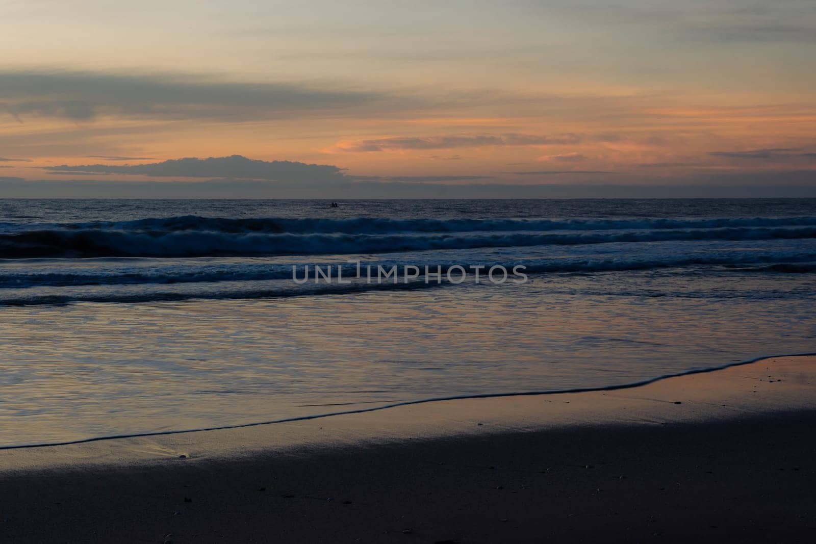 Affirmation photo You are free to be different Love yourself sunset over the sea horizon orange sky clouds dark sea water edge sand.