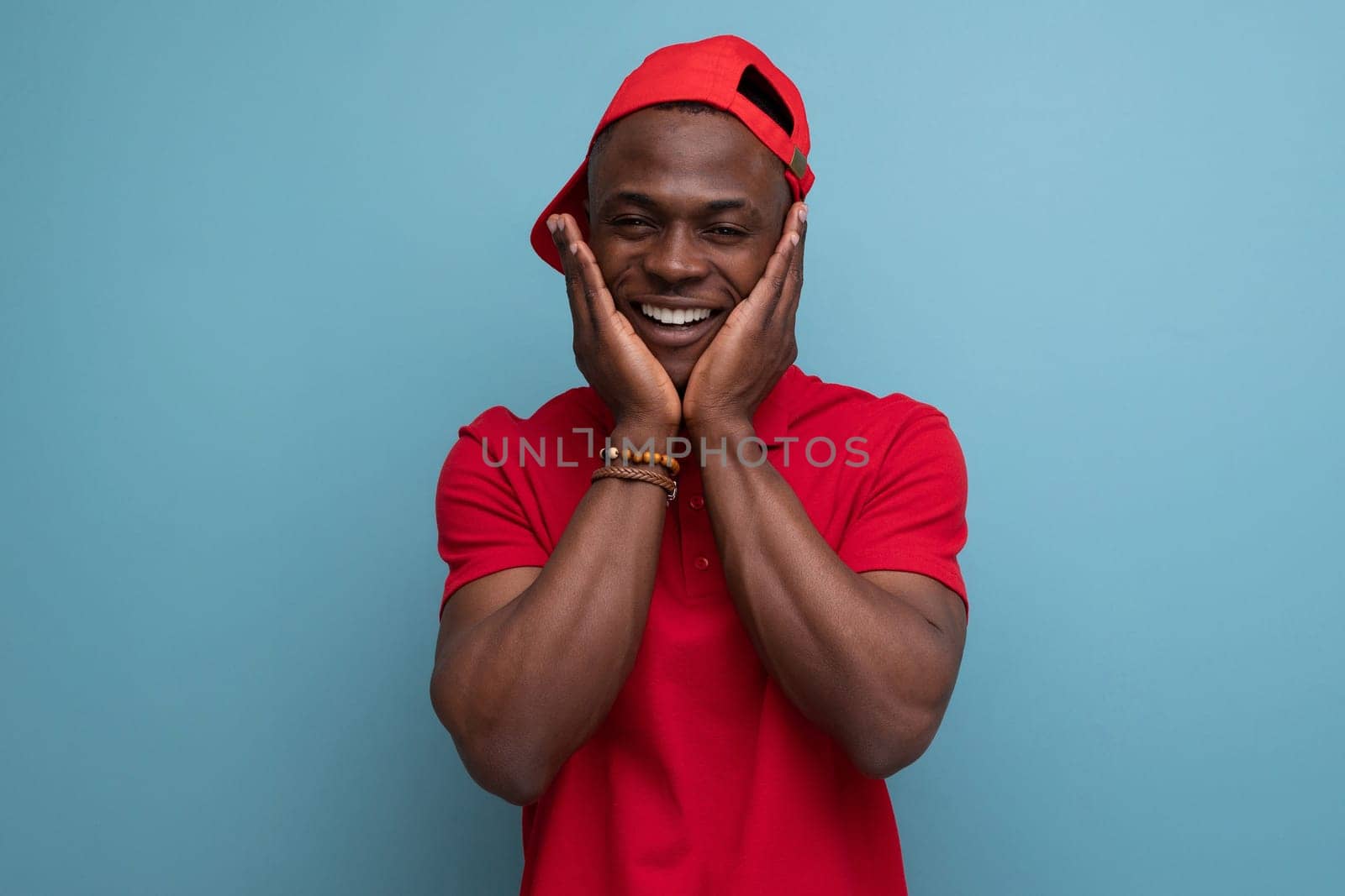 young American man dressed in corporate attire consisting of a baseball cap and a cotton T-shirt by TRMK