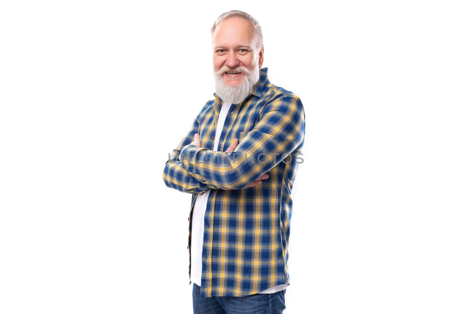 nice well-groomed mature gray-haired man with a beard in a shirt on a white background with copy space by TRMK