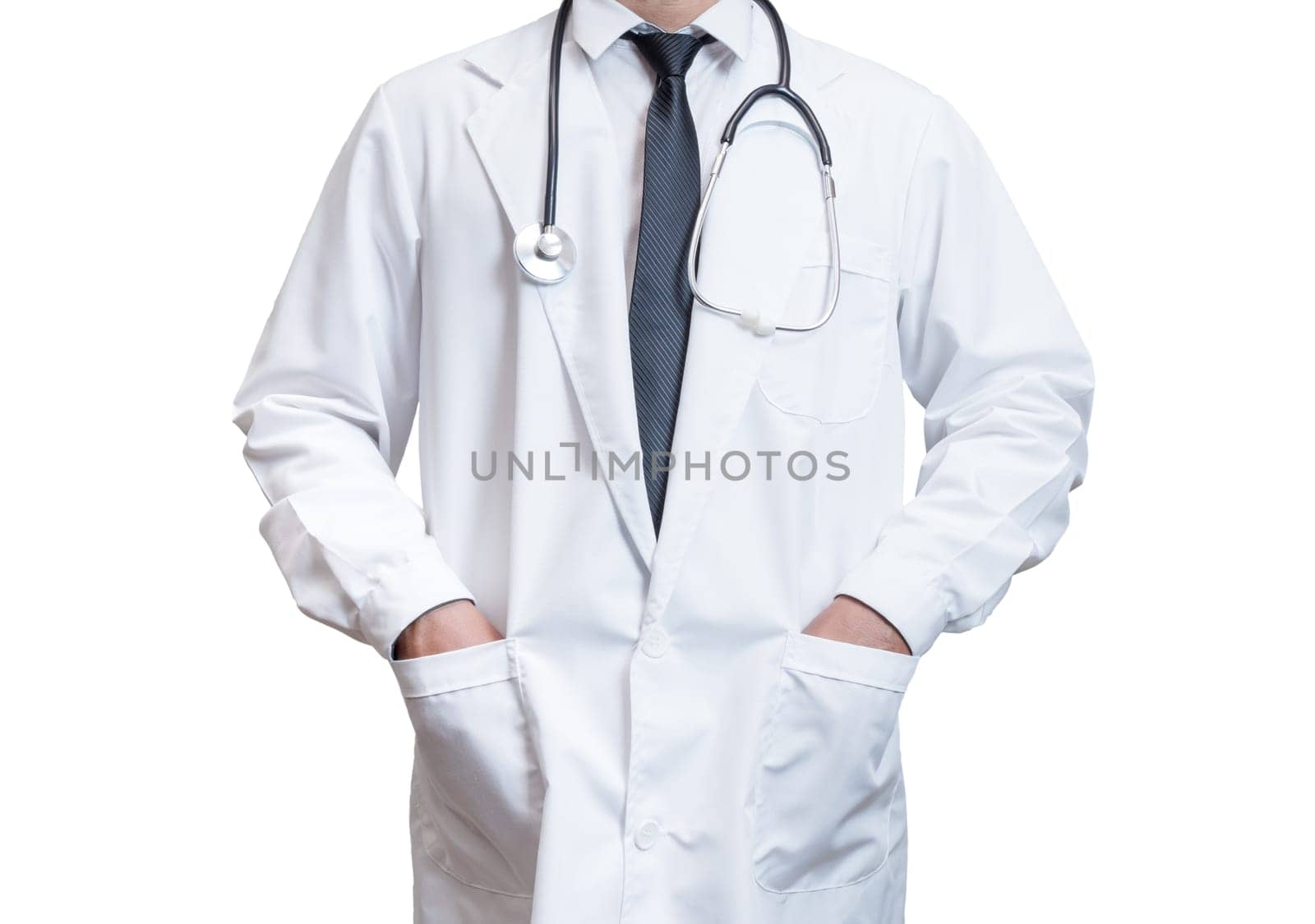 Doctor is standing and his hands in his lab coat on the white background. Medical concept. Medical information search concept. The concept of treating disease. Insurance concept.