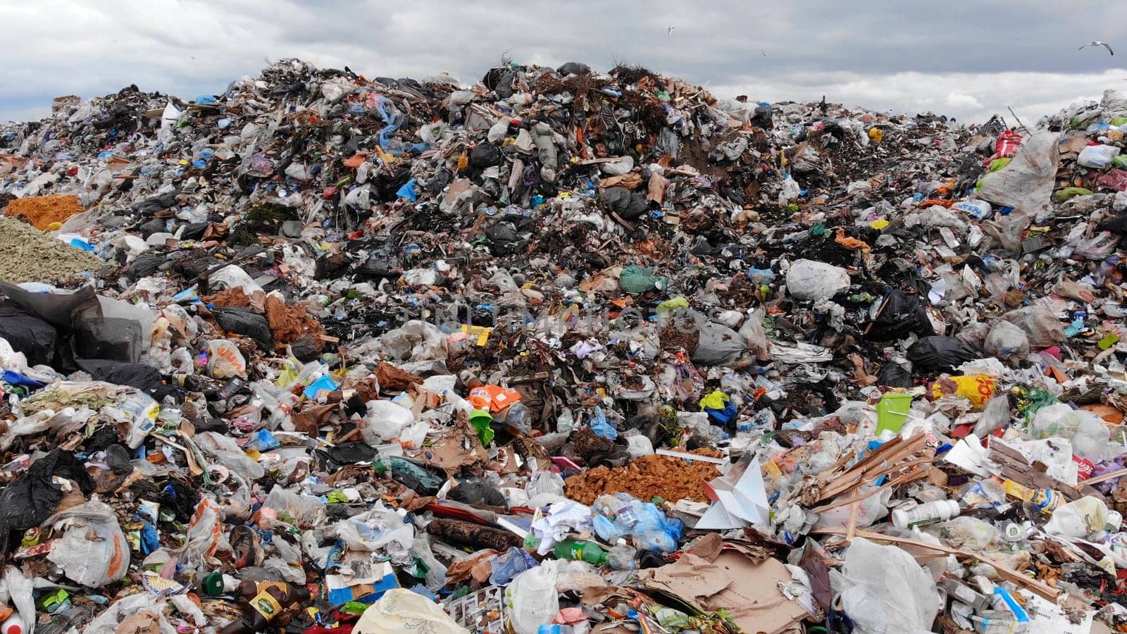 Large landfill near the metropolis. View from the drone
