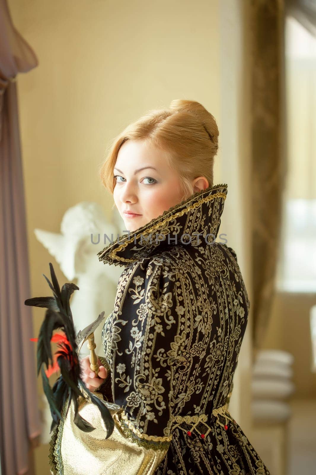 Image of pretty young actress posing in luxury dress