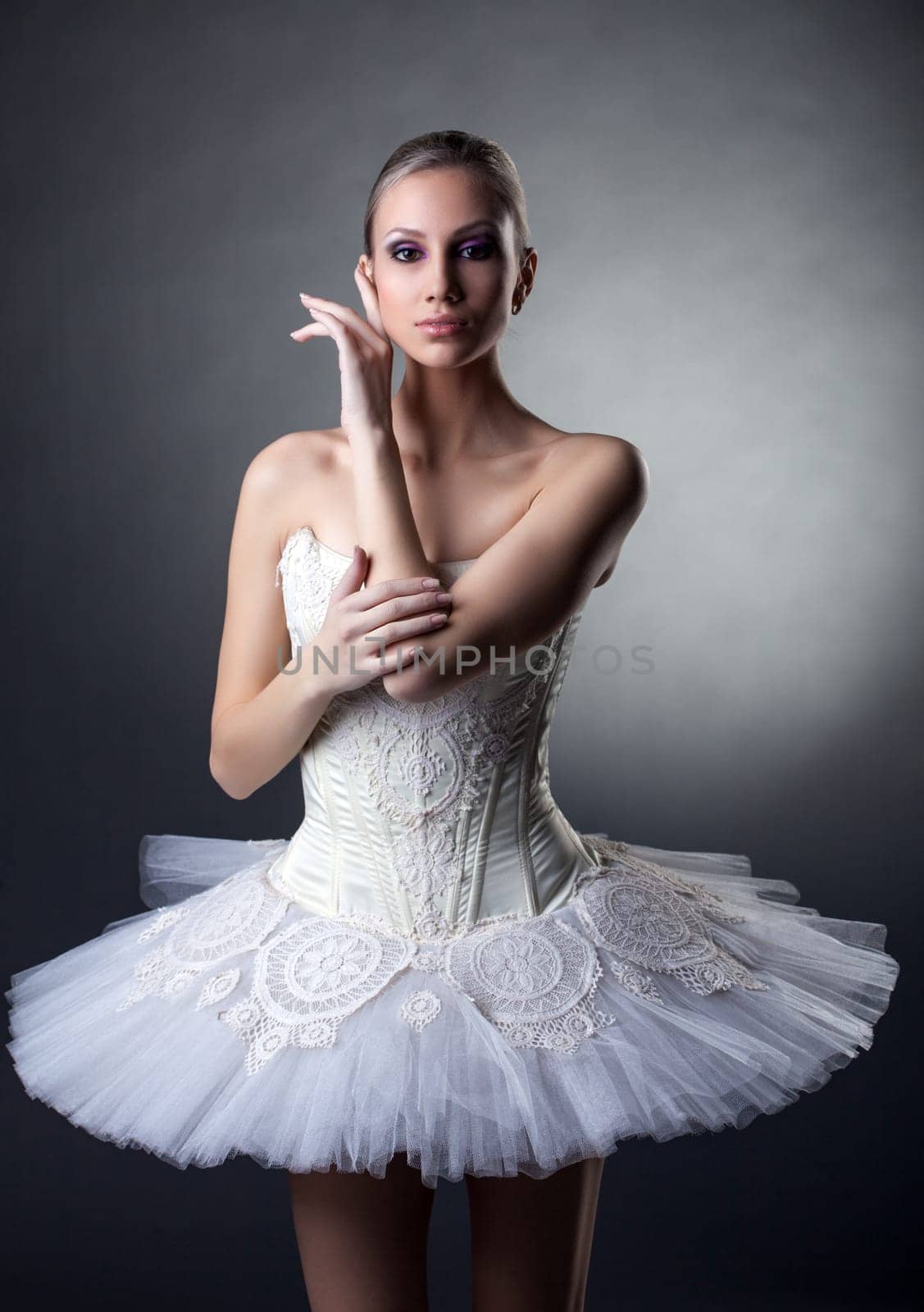 Portrait of beautiful sensual ballerina posing looking at camera