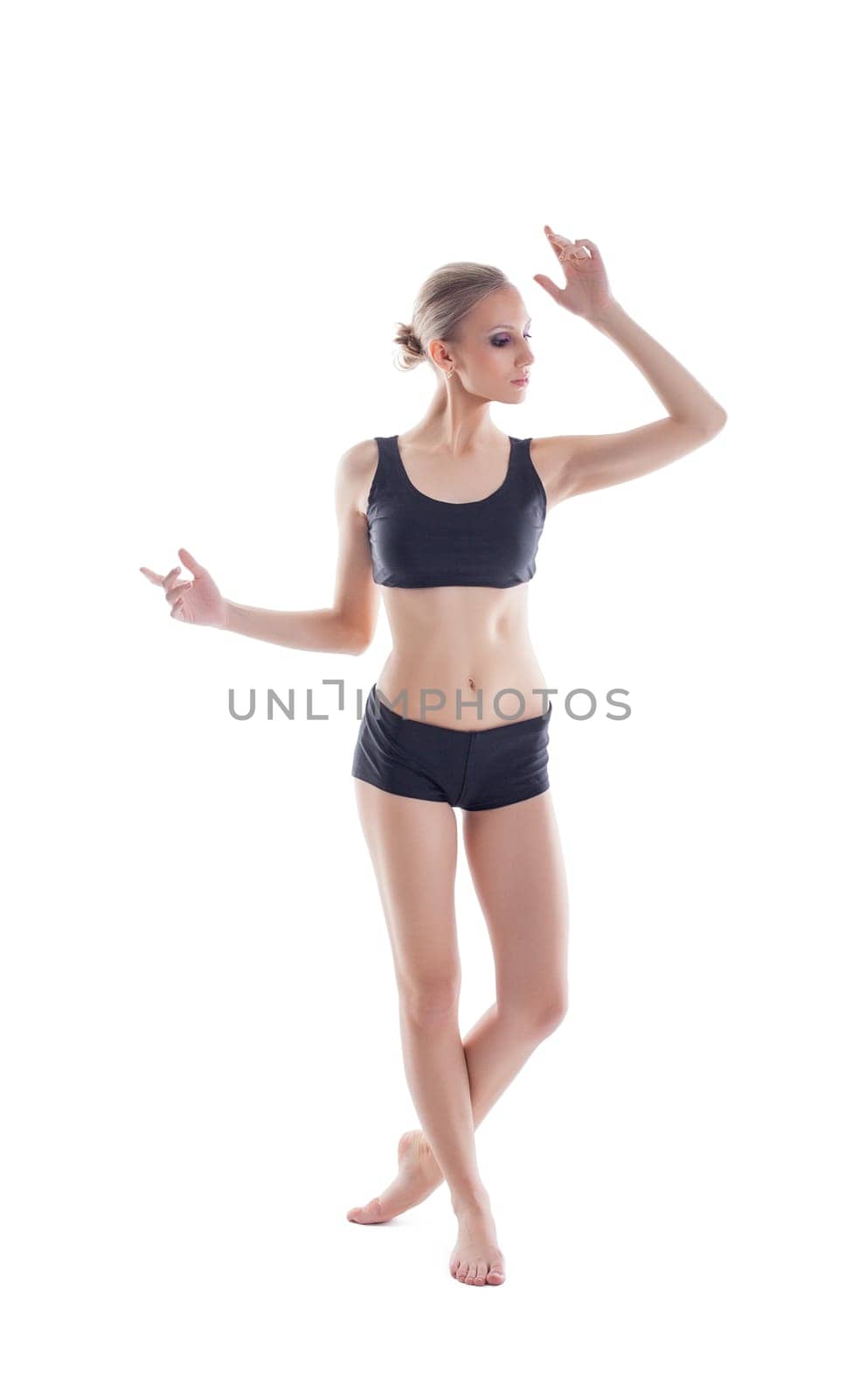 Beautiful slim athlete isolated on white background