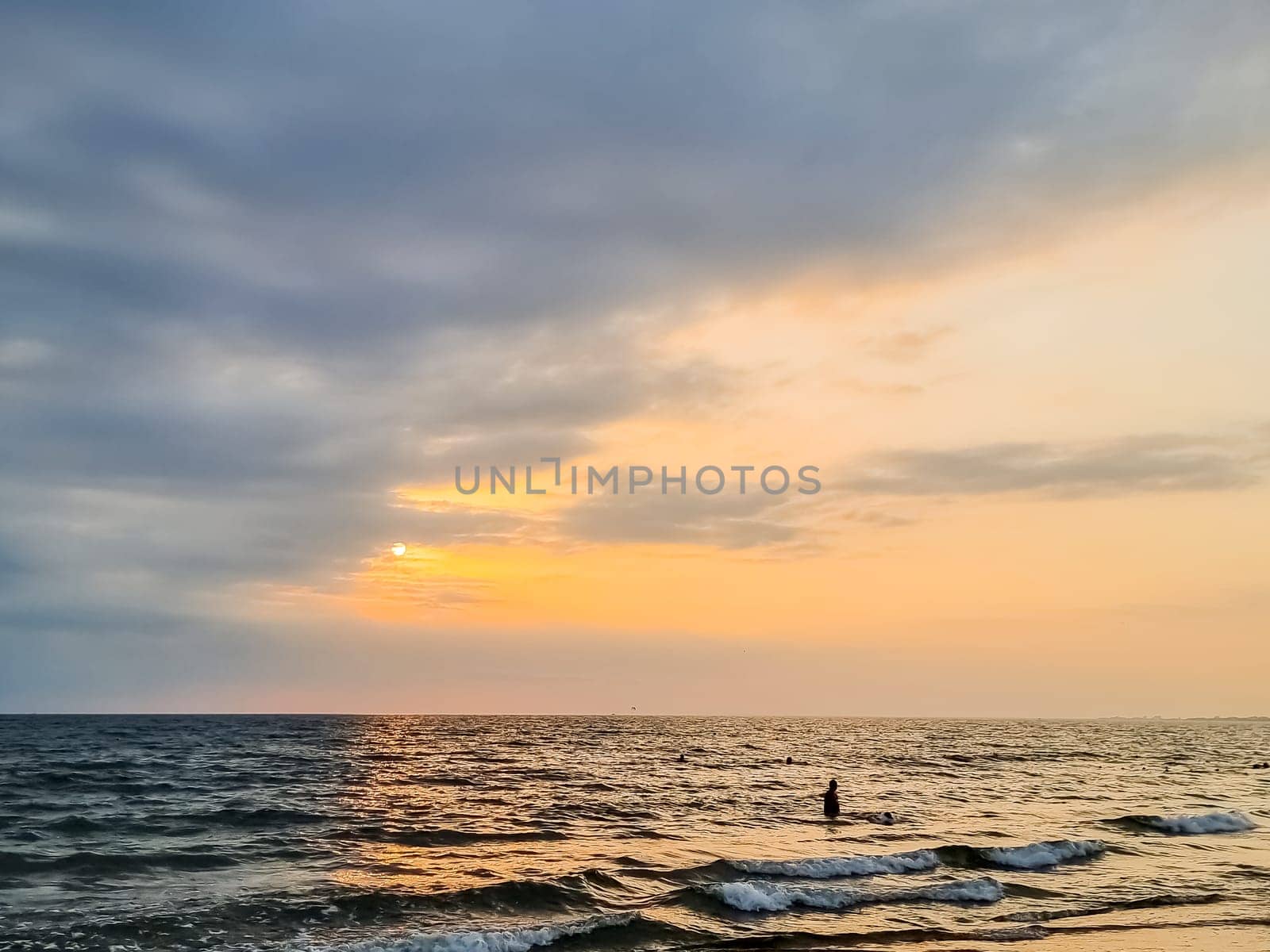 sunset at coast of the lake. Nature landscape. Nature in northern Europe. reflection, blue sky and yellow sunlight. landscape during sunset.