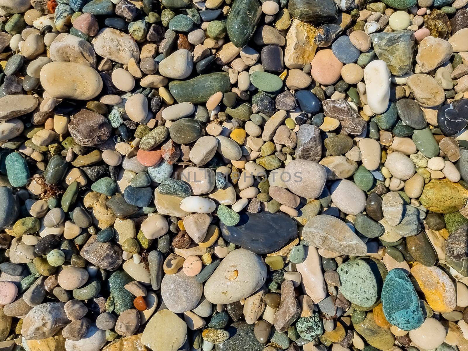 Abstract nature pebbles background. Blue pebbles texture. Stone background. Blue vintage color. Sea peblles beach. Beautiful nature. Turquoise color