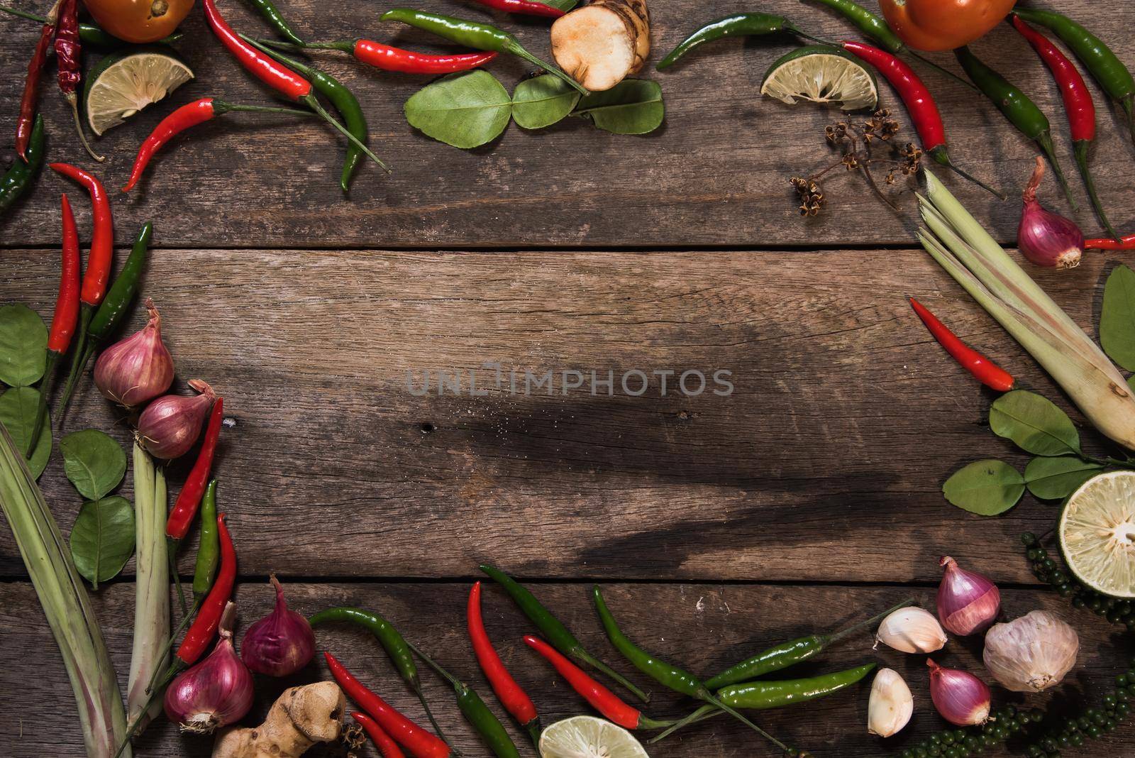 spices with ingredients on wood background. asian food, healthy or cooking concept.
