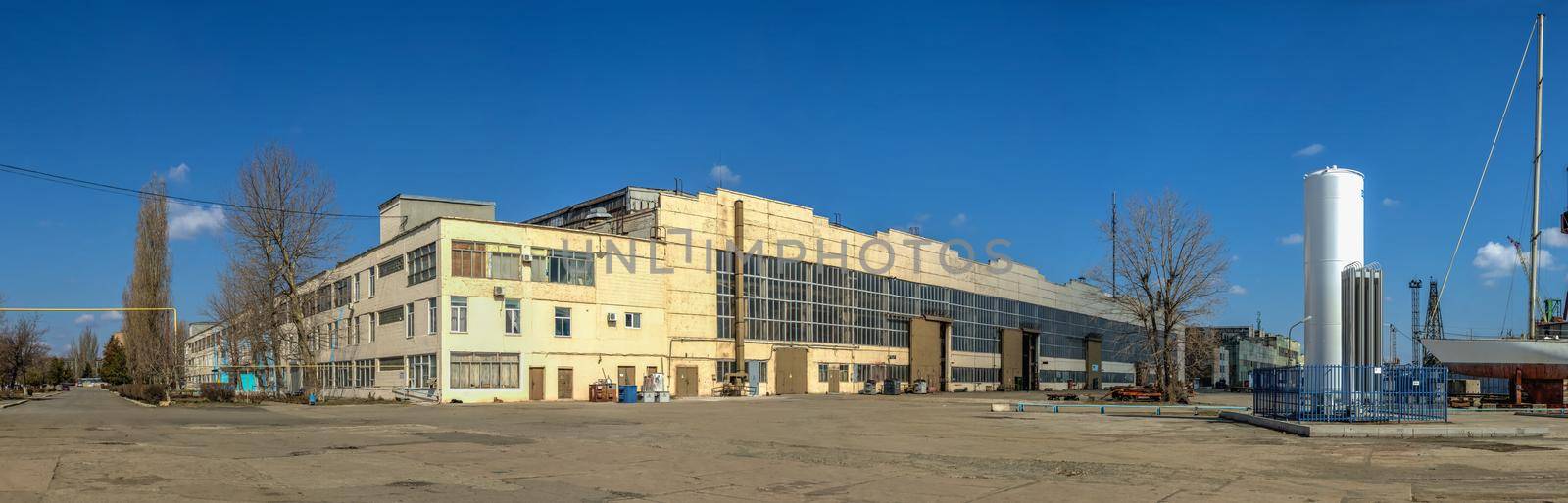 Chernomorsk, Ukraine. 21.03.2021. Factory workshops  of the Chernomorsk Shipyard on a sunny spring day