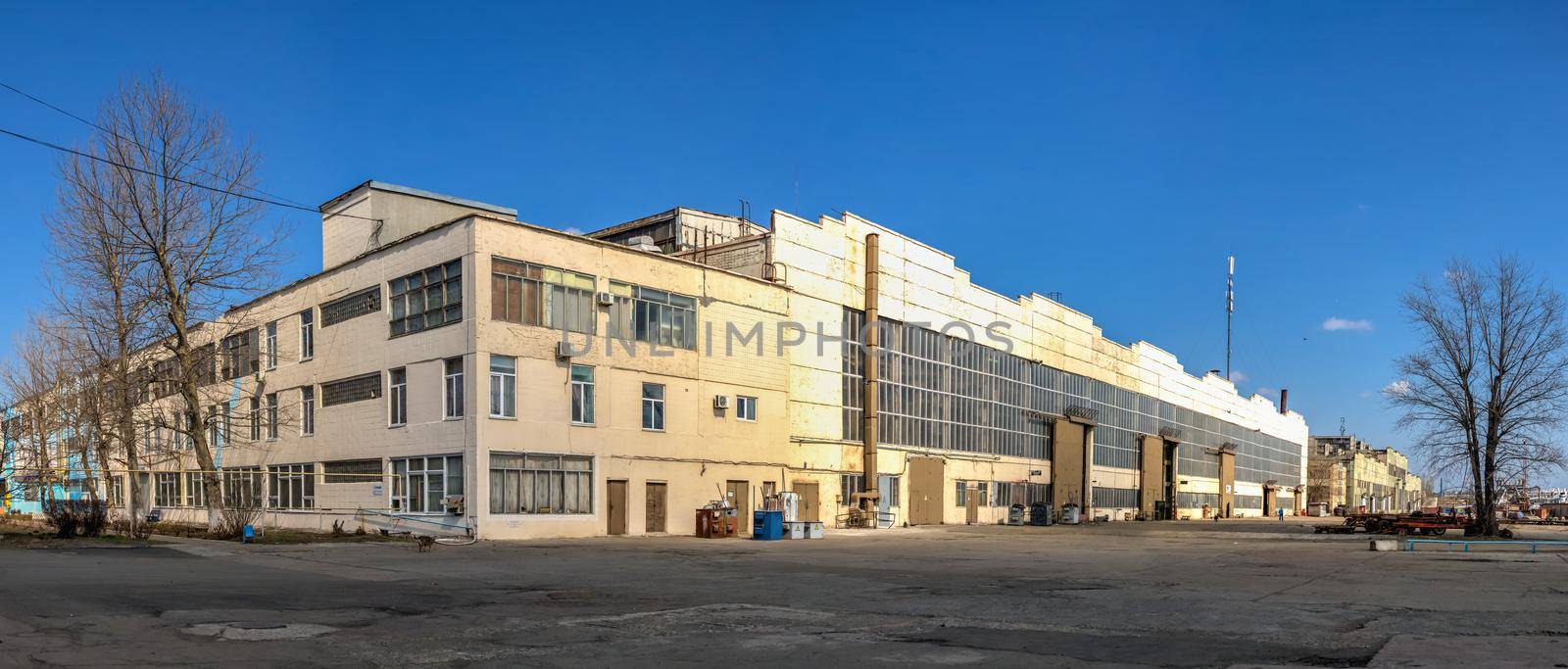 Chernomorsk, Ukraine. 21.03.2021. Factory workshops  of the Chernomorsk Shipyard on a sunny spring day