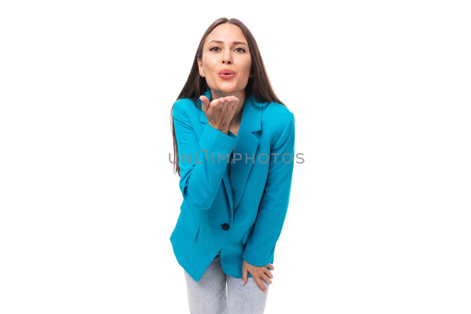 young confident pretty brunette leader woman with long hair in a blue jacket.