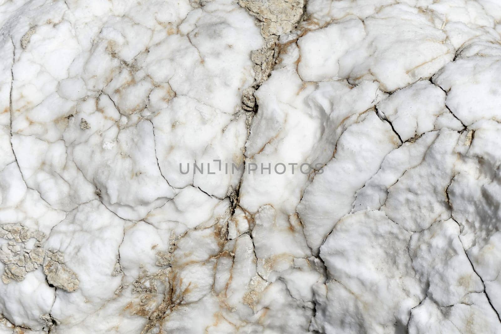 Geology. White marble stone surface with cracks.Finishing material by jovani68