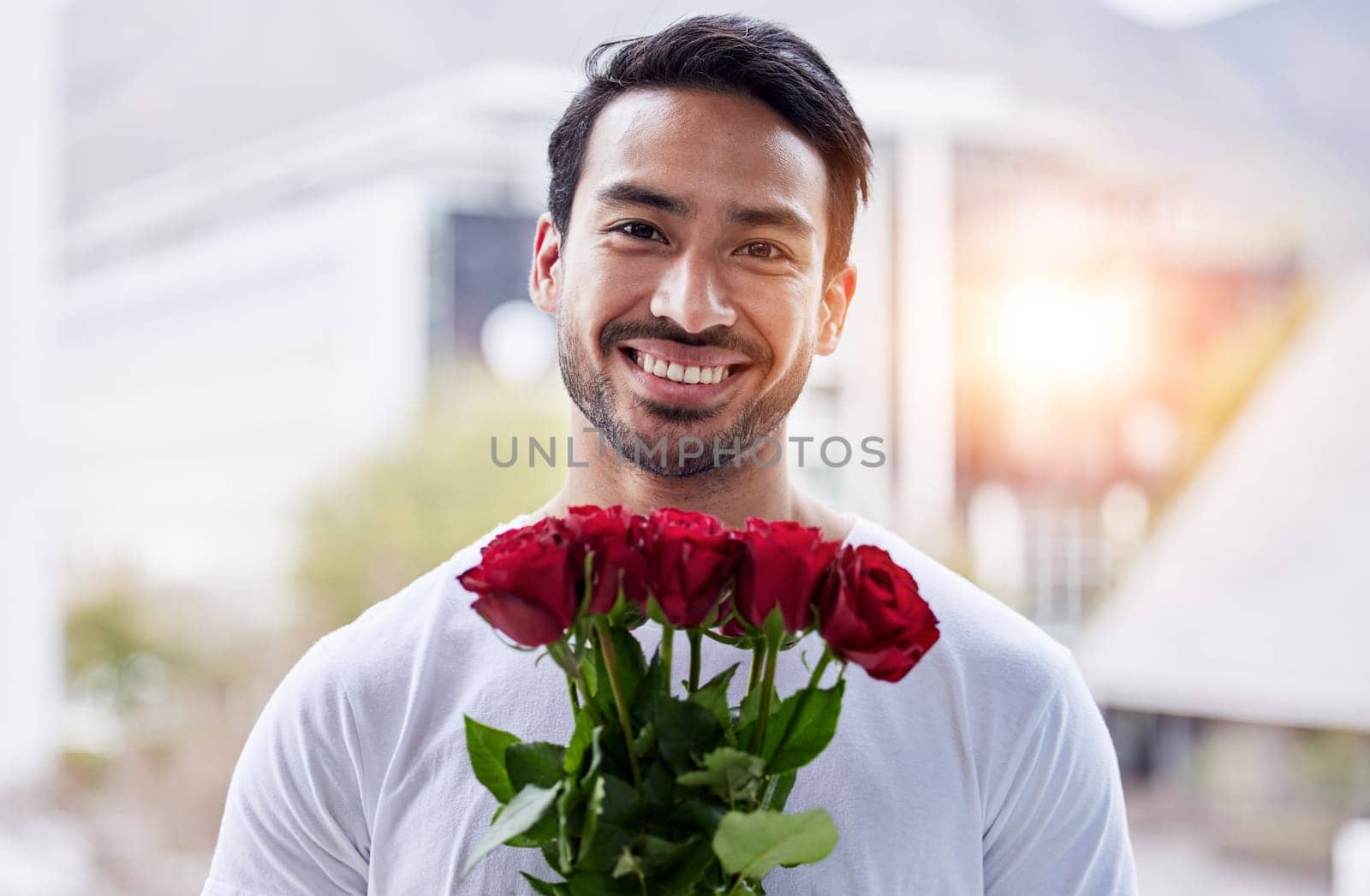 Smile, portrait and man with bouquet of roses for date, romance and hope for valentines day. Love confession, romantic gift and happy male holding flowers outside in city for proposal or engagement