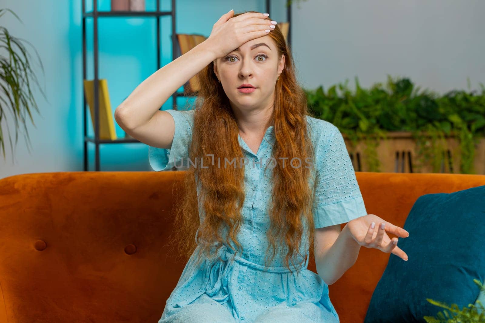 Upset young woman making face palm gesture, feeling bored, disappointed in fail bad results news by efuror