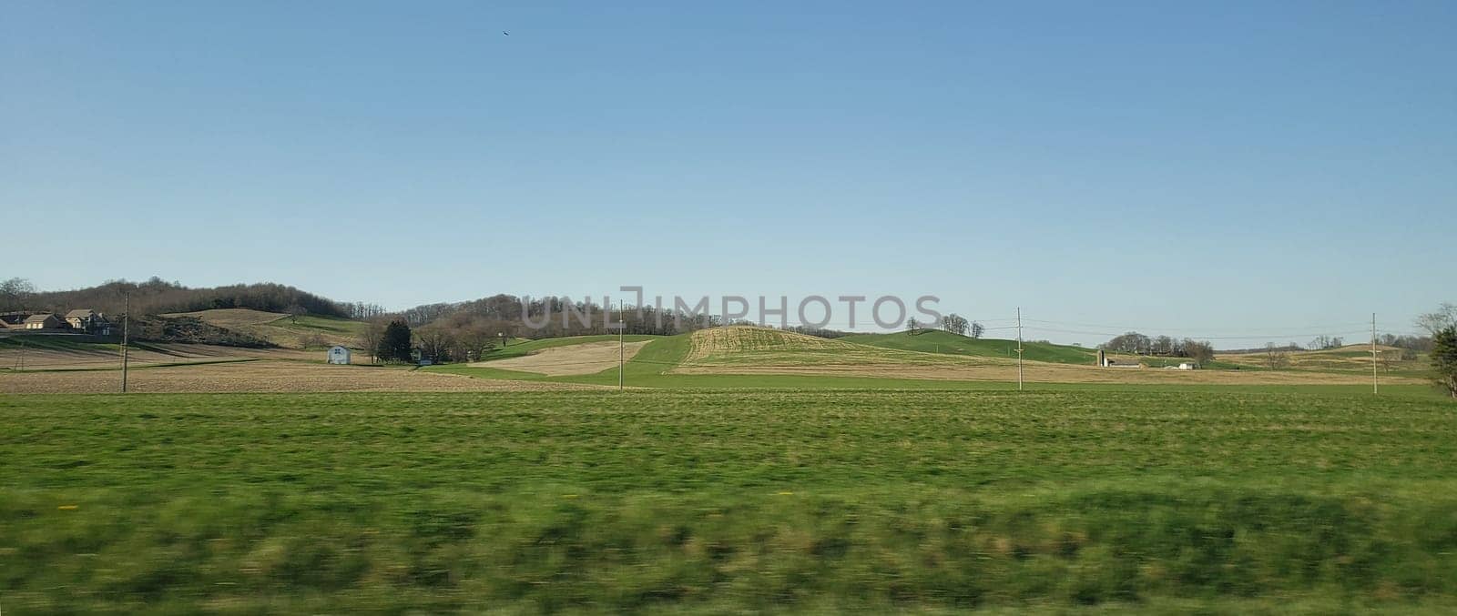 View of Rolling Green Hills and Blue Skies in Early Spring, Ohio